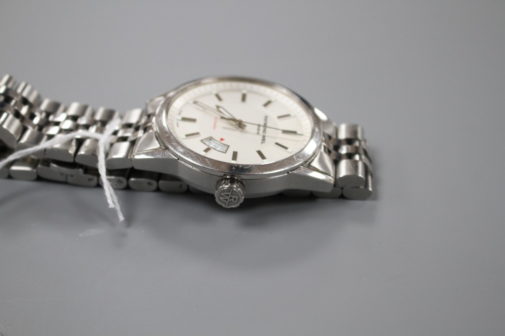 A gentlemans modern Raymond Weil stainless steel automatic wrist watch, on Raymond Weil stainless steel strap.